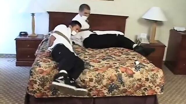 2 men tape gagged