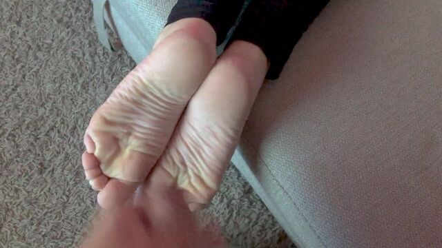 Natalie's soft feet cumshot