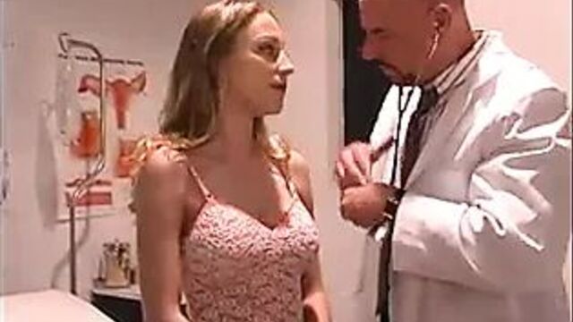 Doctor inserts speculum into pretty c-cup blonde's lubed twat