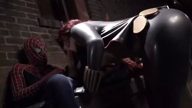 Sexy black widow with her latex tits and ass