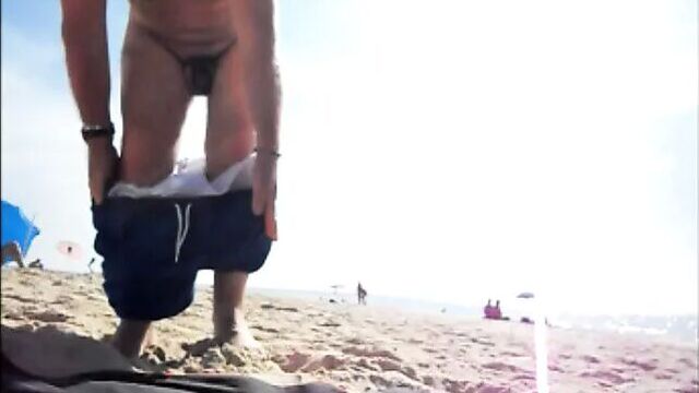 My husband encaged on the beach