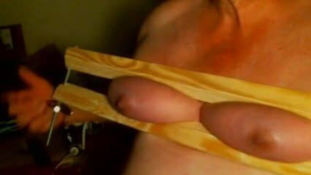 Trying to stretch my tits bigger