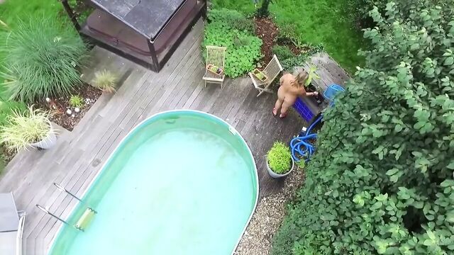 My nudist stepmom in our garden