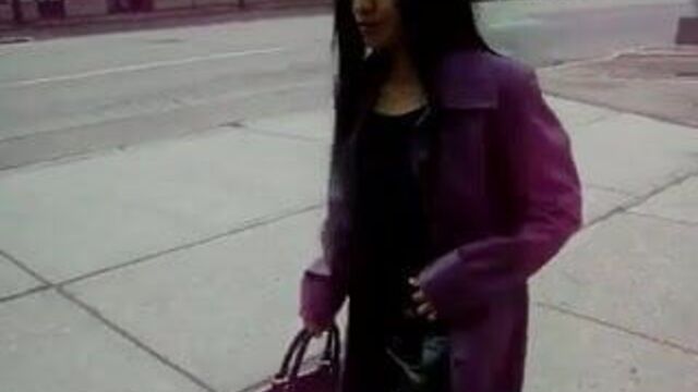 Asian in purple leather coat